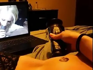 Tattooed babe loves to masturbate to interracial porn  