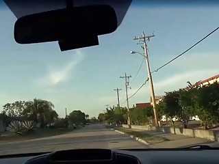 Slutty whore in stockings sucks dick in a car