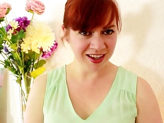 Redhead in stockings pleasures her hairy juicy cunt