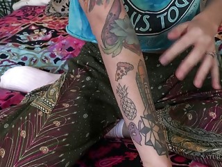 Skinny tattooed girl shows her hairy pussy on a webcam