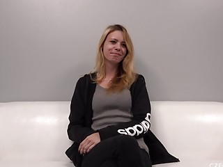 Sluty amateur gets naked and enjoys masturbation on a casting