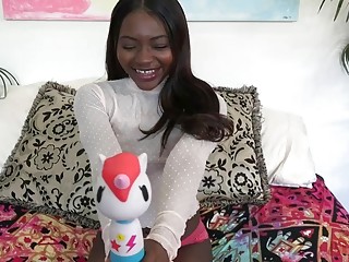 Horny ebony girl Noemie Bilas penetrates her black shaved pussy