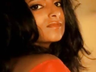 Cute naked Indian girl plays softcore with a giant snake